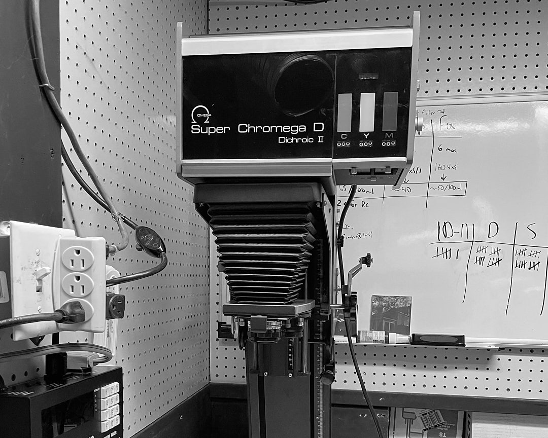 A black and white photo of a commercial photo enlarger