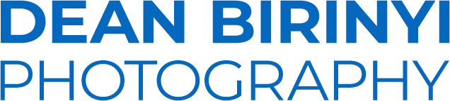 Dean Birinyi Photography Blue Logo