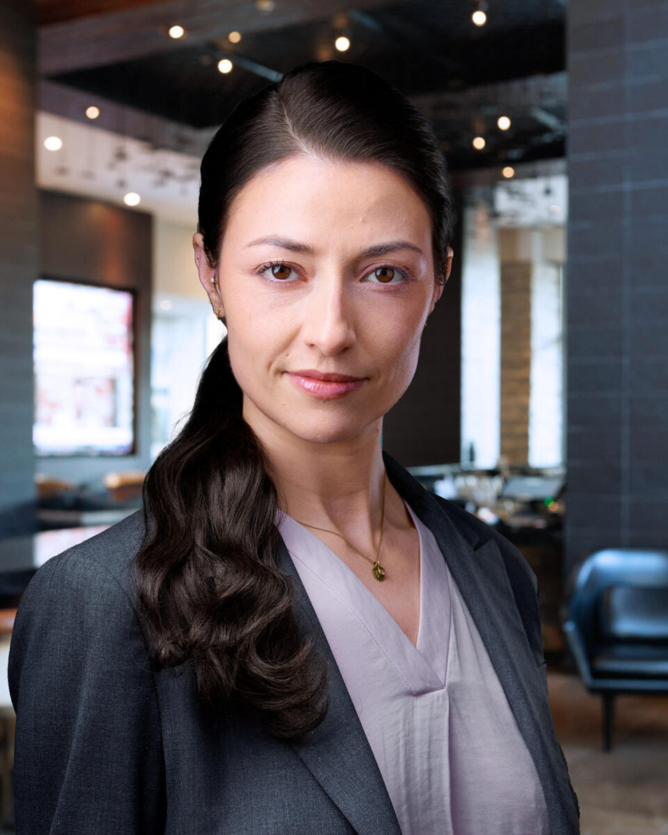 Professional woman in blazer with confident expression, photographed by Dean Birinyi in Palo Alto.