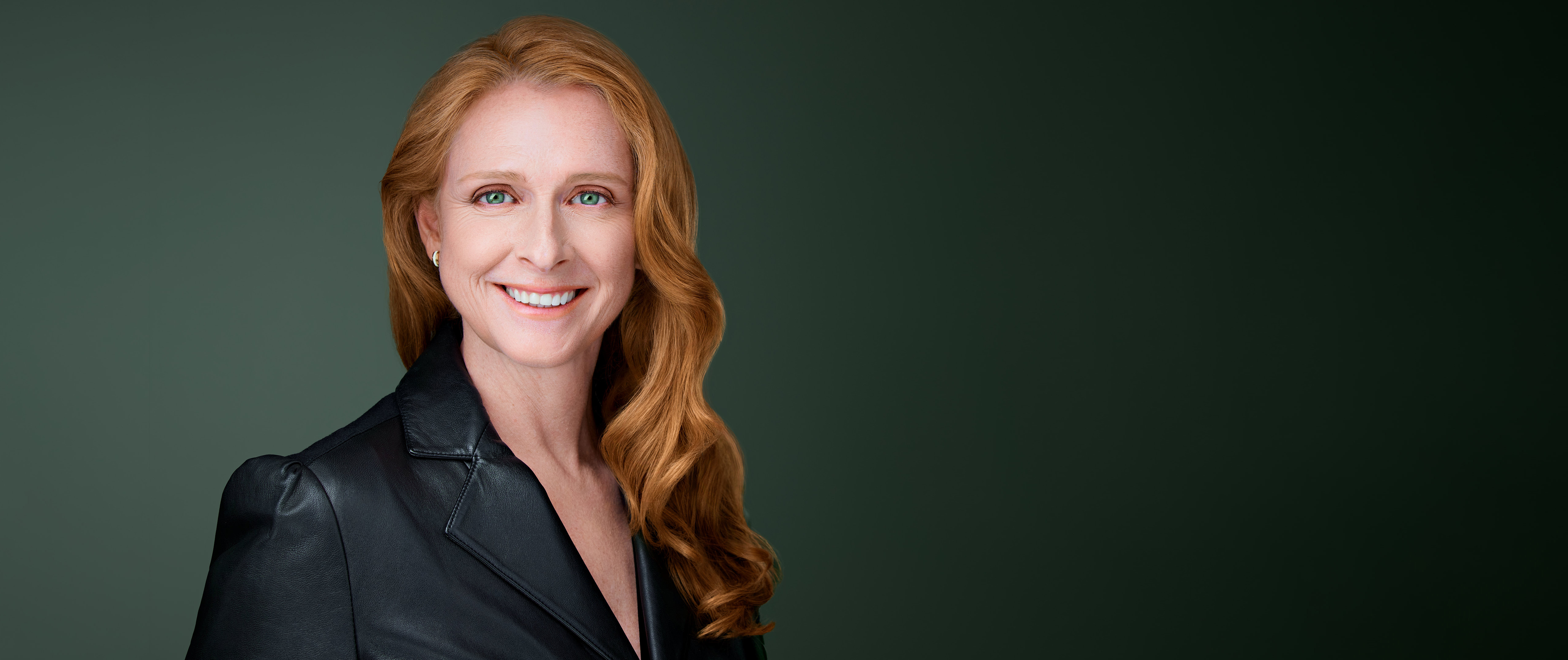 Professional headshot of Felicia Womack, CEO of Wakeupbrother.org, photographed to express charm, authenticity, and executive confidence.