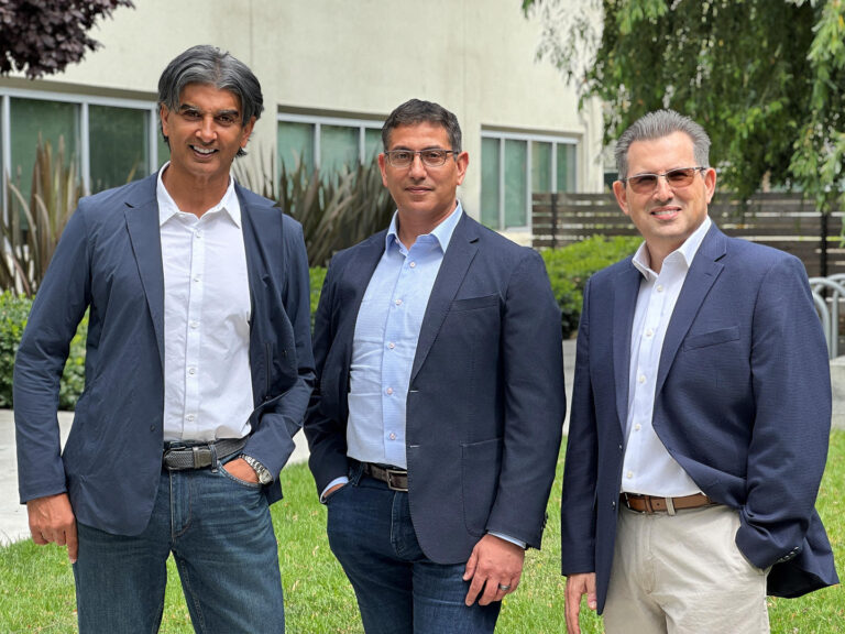 Three Redwood City executives in blazers, outdoors, photographed for professional company headshots by Dean Birinyi.
