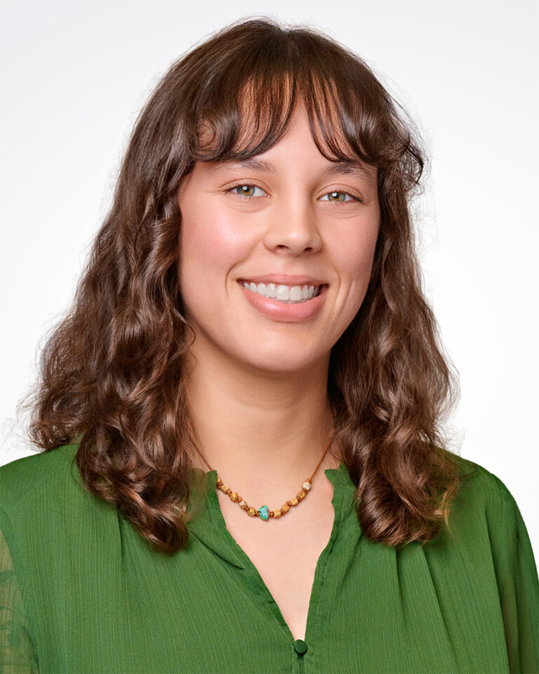Alexis Lutter-Lee, Marketing Events Coordinator at Fenwick & West LLP, smiling in a professional headshot used to highlight her testimonial about the streamlined corporate headshot system.