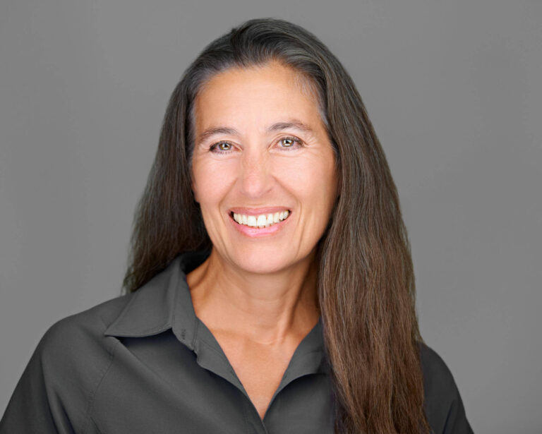 Company headshot of a professional woman photographed in Mountain View by Dean Birinyi