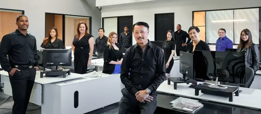 Corporate team photographed in office environment during on-location headshot session in San Mateo, CA.