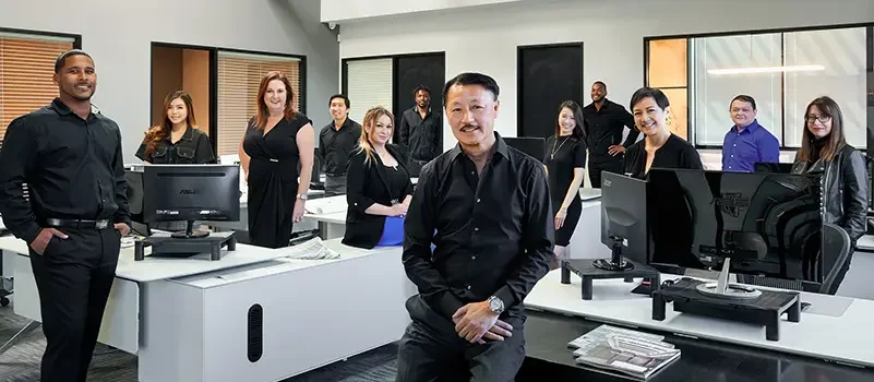 On-site corporate team photo for a South San Francisco company photographed in a professional office environment